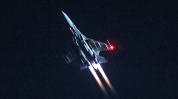 Fighter jet returns at dawn